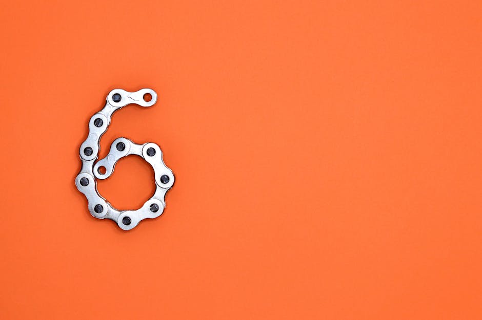 Metal chain links forming the number six representing network connectivity