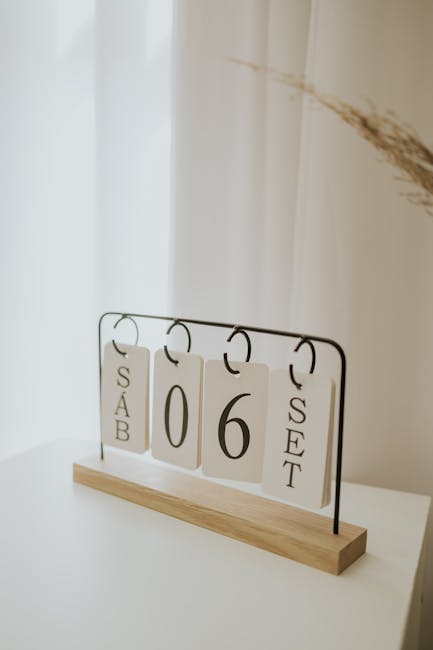Modern desk calendar showing number six representing scheduled delivery